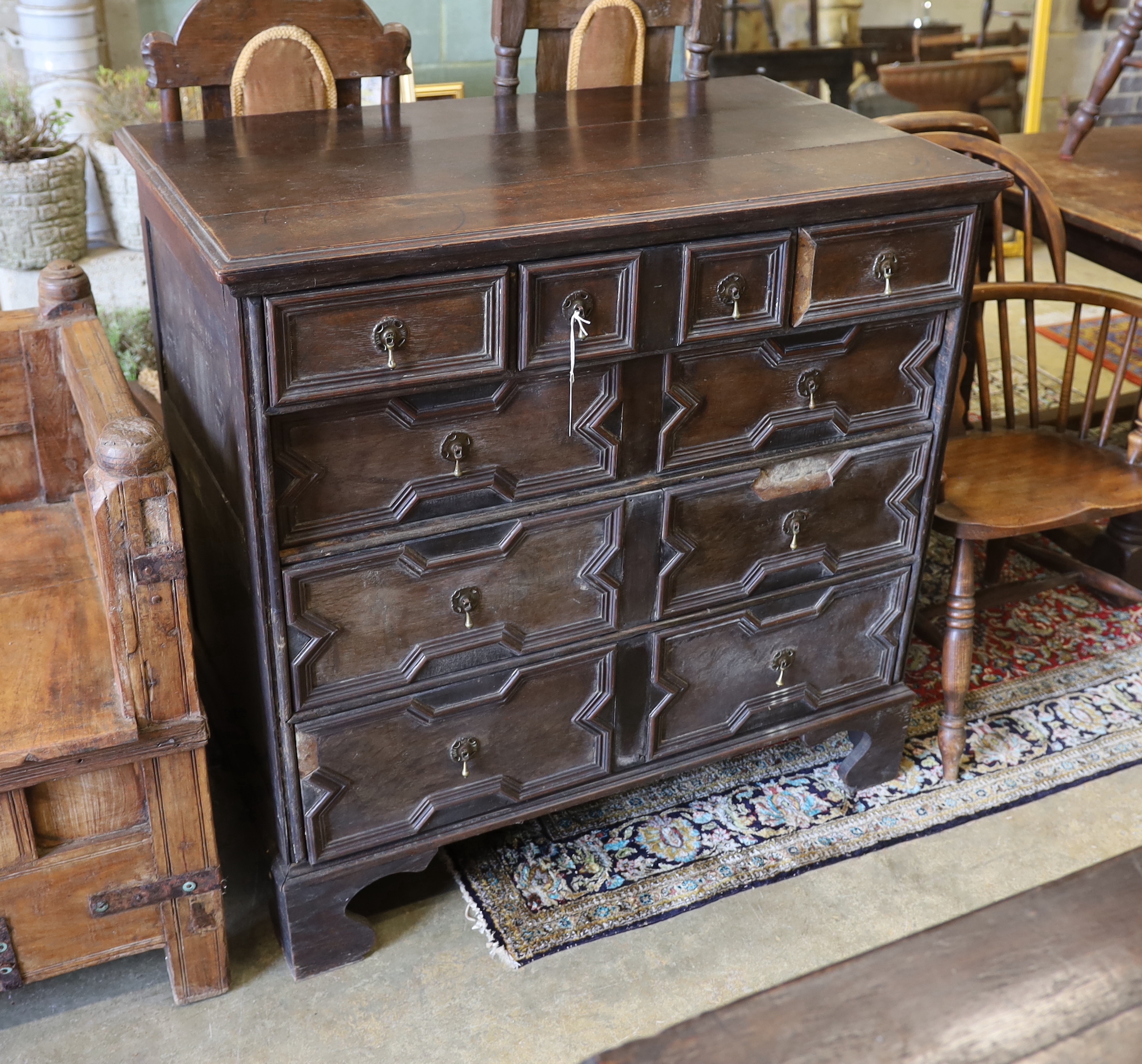 An 18th century oak geometric moulded six drawer chest, width 101cm, depth 58cm, height 99cm